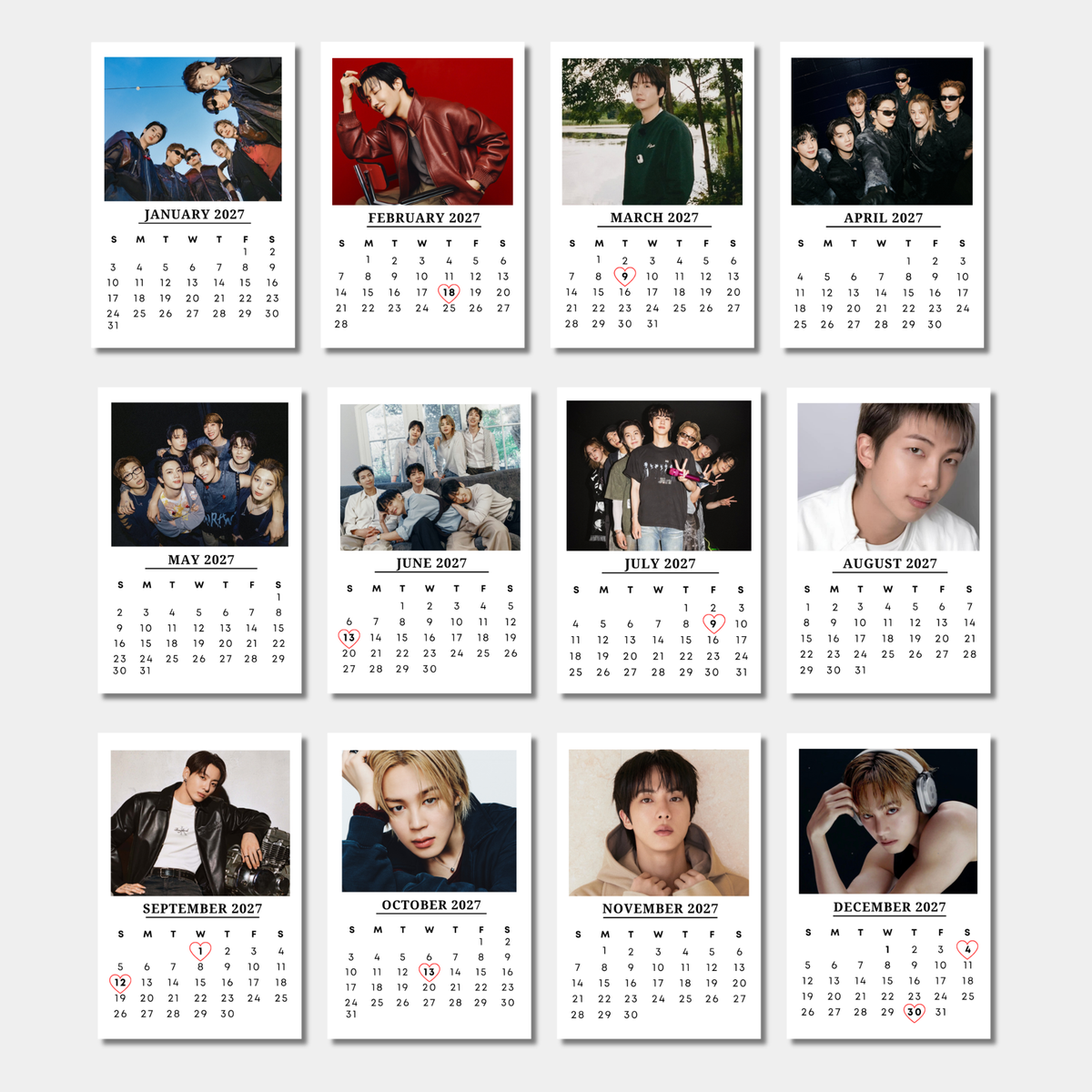 A 12-month calendar print for 2027, featuring a grid of monthly pages with black-and-white group photos of a male idol band, highlighted with red dates for the days of the week.
