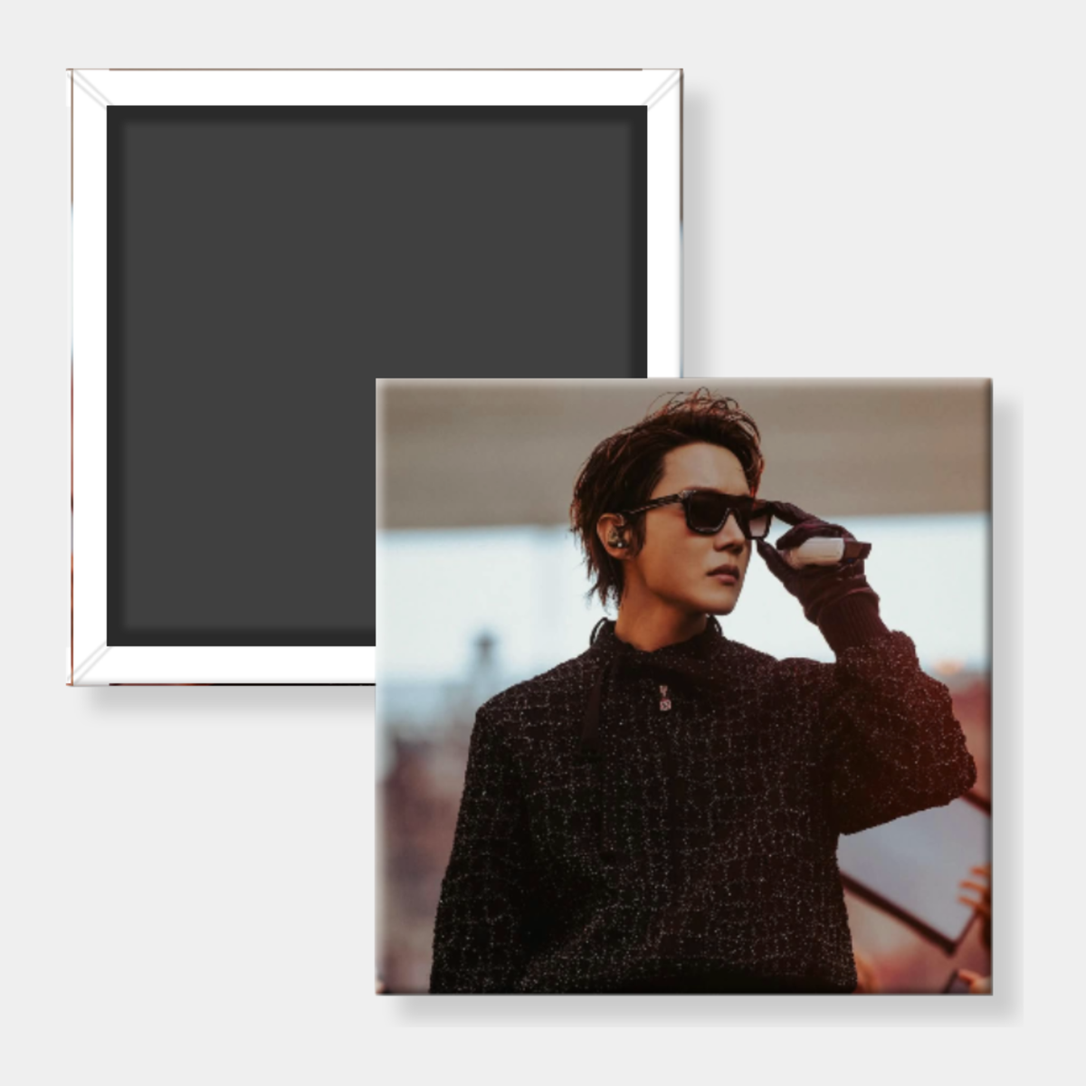 A square photo magnet or printed magnet shown from the back and front. The back is plain dark gray with a white border, and the front displays a portrait of a man wearing sunglasses and a dark textured jacket against a softly blurred outdoor background.