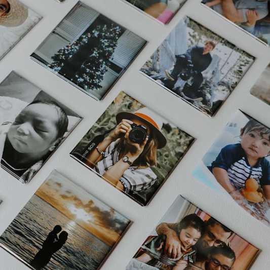 Collection of various photos on a white surface