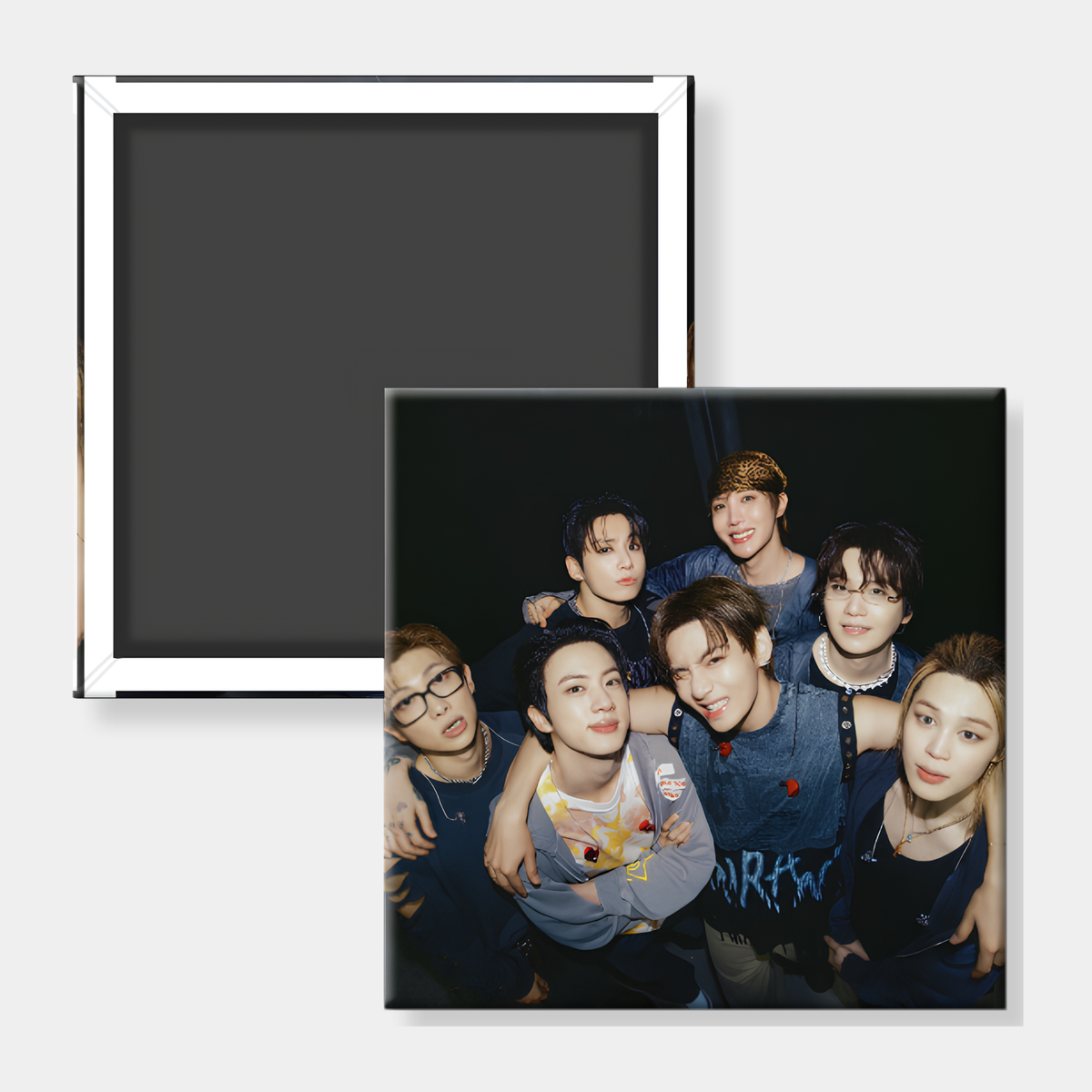 A square photo magnet showing a group of young men posing together, displayed alongside its black magnetic backing on a light gray background.