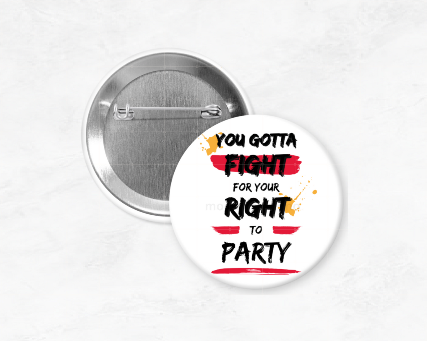 Round pin badge with the text 'You Gotta Fight For Your Right to Party' printed on it.